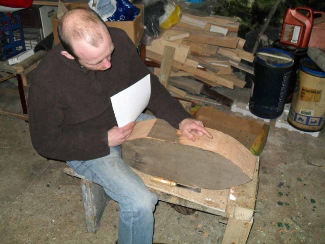Brian checks the progress of the chiselling of his hull. Photo: SR